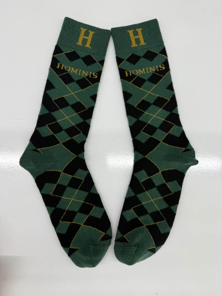 Hominis branded knitted socks — original SocksPrime production sample photograph
